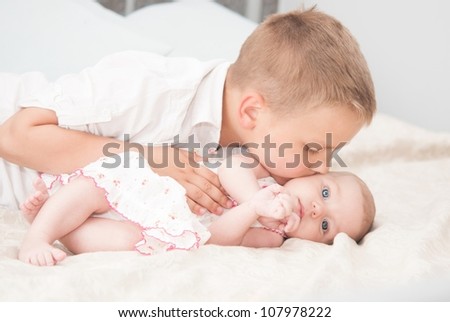Adorable sister and brother portrait