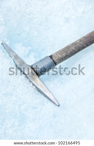 Ice pick used to carve steps into the bluish ice of glacier. At Franz Josef Glacier New Zealand