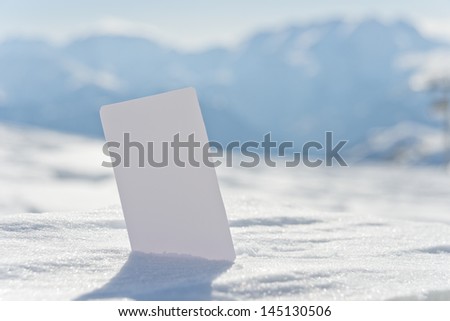 Ski lift pass stuck in snow ready for your design. Concept to illustrate winter sport admission fee