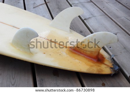 Broken & fixed fins of a surfboard after Shark attack in the Surf
