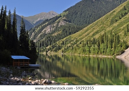 Idyllic Landscape with Kolsai Lake and Tien Shan Mountains in Kazakhstan Central Asia