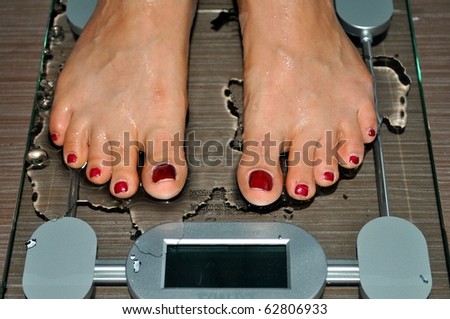 Too heavy? Naked wet feet on electronic scale