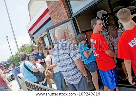 PENSACOLA, FL - AUGUST 1: Patrons line up at Chick-Fil-A restaurant in Pensacola, FL, on August 1, 2012 on national Day of Support following backlash from the owner supporting traditional marriage.