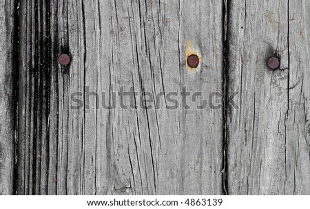 dry wood with rusty nails