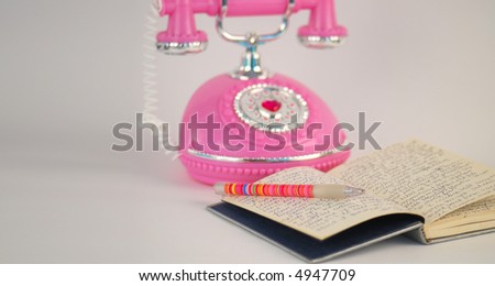 Princess Telephone Next to Open Diary