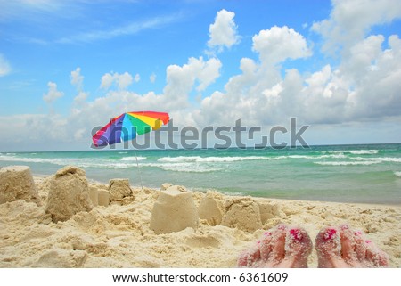 beach sand castle. Umbrella and Sand Castles