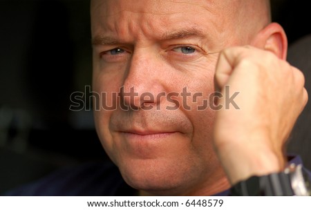 Serious And Tough Looking Man With Furrowed Brow Stock Photo ... Serious And Tough Looking Man With Furrowed Brow Stock Photo ...
