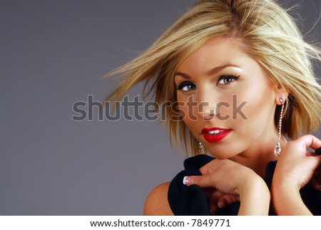 Pretty Blonde Woman with Blowing Hair