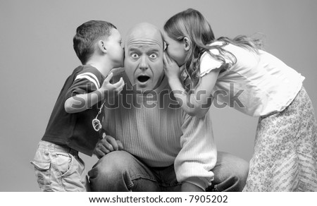 Whispered Secrets Being Told to Dad by Kids