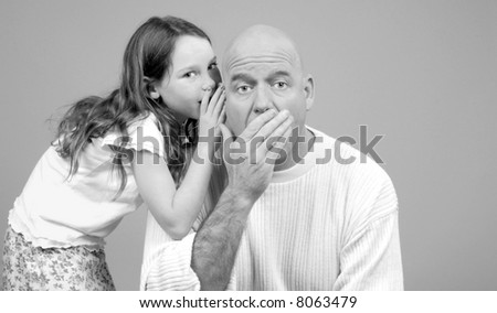 Father Being Told Secret by Daughter