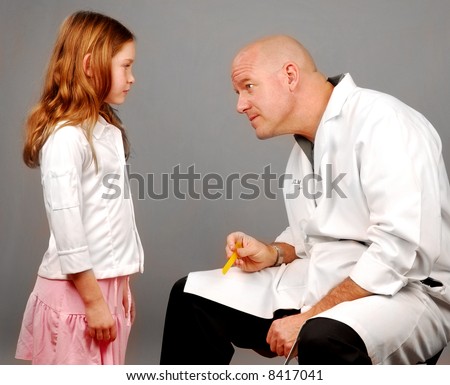 Doctor at child at physical exam