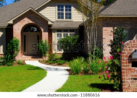 Attractive brick home and landscaping