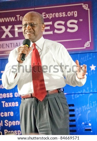 TAMPA - SEPTEMBER 12: Republican candidate Herman Cain addresses supporters after the CNN/Tea Party Express debate in Tampa, Florida on September 12, 2011.