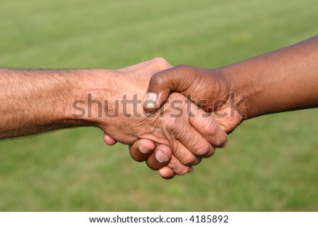 stock photo : Black and white man shaking hands