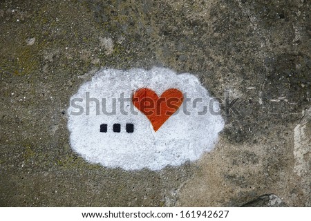 heart drawing on an old wall