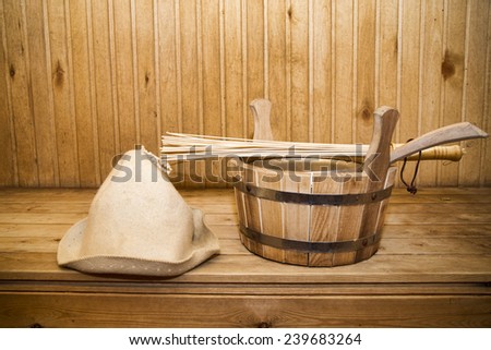 Sauna, bath accessories. Wooden bucket and hat