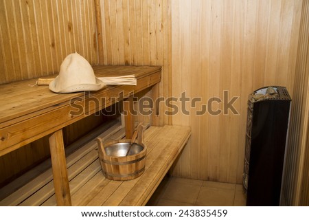 Sauna, bath accessories. Wooden bucket and hat