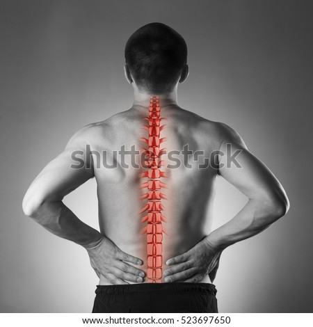 Spine pain, man with backache and ache in the neck, black and white photo with red backbone on gray background