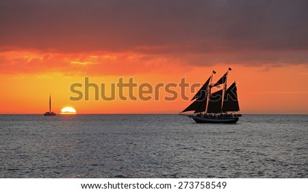 Key West sunset, Gulf of Mexico with yachts and boats on the background
