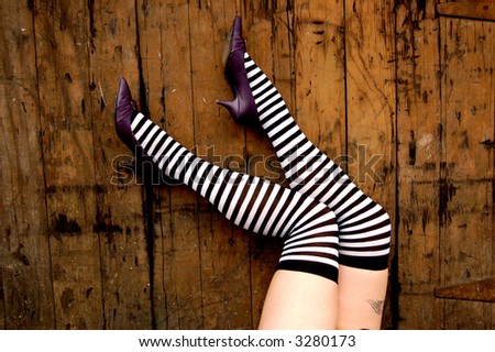 striped stockings and pointed toes