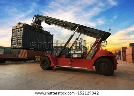 Stack of Freight Containers at the Docks with Truck Stack of Freight Containers at the Docks with Truck