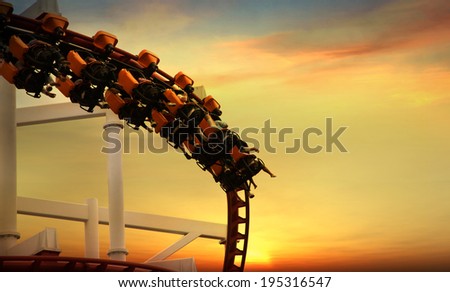 Roller Coaster loops in the sunset