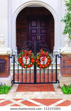 Doorway with Christmas decorative Wreath Hanging in Front of door