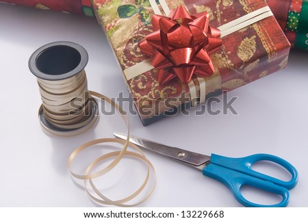 Preparing gift for the holidays,wrapping gift box.