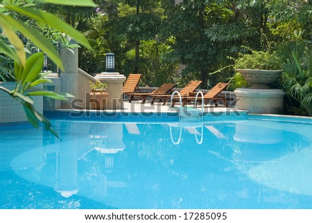 chaise longue and swimming-pool