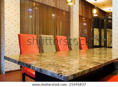 The classic conference office with  long formal table and chairs in a hotel,normally this room is used for small business conference or dining