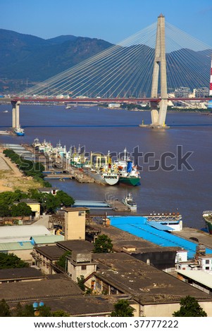 stayed-cable bridge  and boatyard in the minjiang river