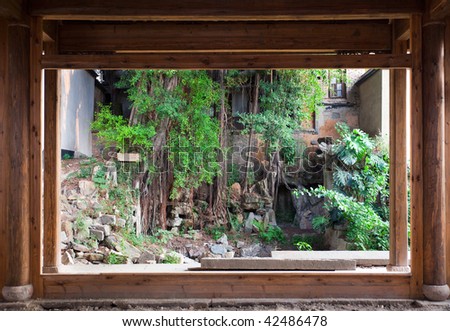 Chinese style backyard viewed from a old empty house.This backyard and house are  a typical architectural style of the Ming and Qing Dynasties in southeast China