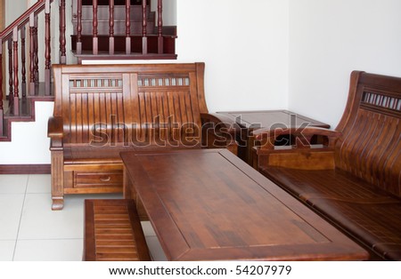 Old style wooden sofa suite in a new house