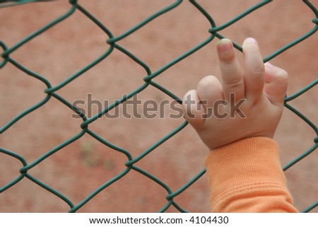 a hand in the fence saying the number two