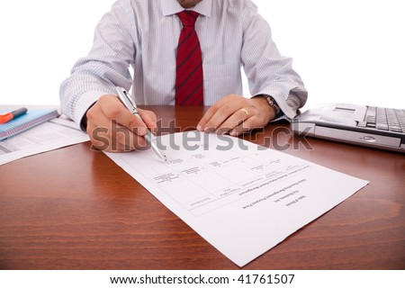 businessman at the office signing a contract