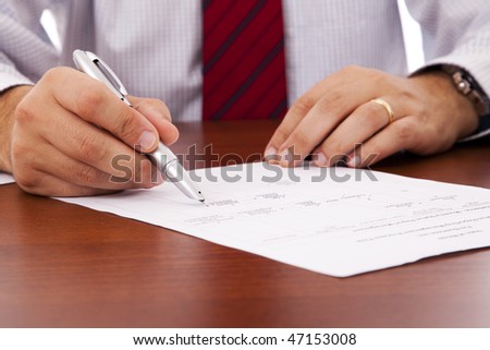 businessman at the office signing a contract