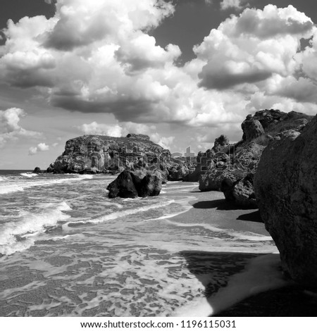 Rocky seashore. Black and white art photo.