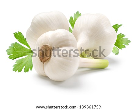 Garlic and parsley leaves isolated on white background.