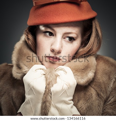 Classic Beauty Clutching Her Faux Fur