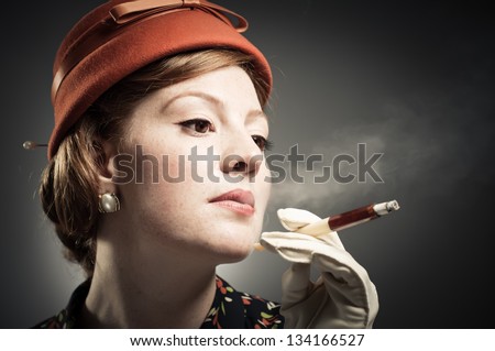 Retro woman smoking a cigarette