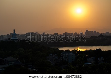 Overlook of Beijing city at the hill of Jingshan park during the sunset