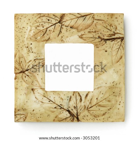 Square frame with motive of leaves in sepia color, isolated on white background