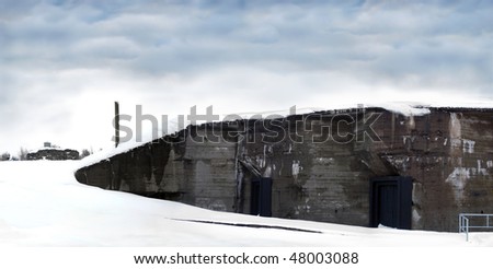 Fortress of Czech defense against Hitler army built in 1938, in winter, with another bunker in background
