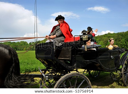 RATIBORICE, CZECH REPUBLIC - MAY 22: Imperial maneuvers - Reconstruction of historic event, noble people in carriage, May 22, 2010 in Ratiborice, Czech Republic