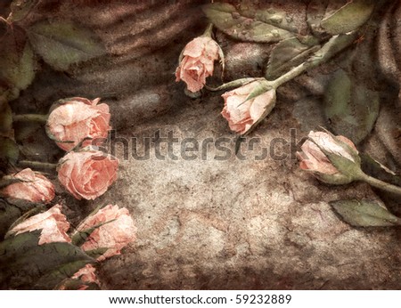 Grungy pink roses composition on stones with waterdrops