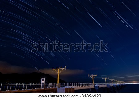star trail at night in Hong Kong International Airport runway