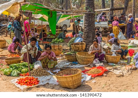 Bagan, Myanmar - February 24: Women Are Selling Vegetables At The Local Market On February 24, 2012 In Bagan, Myanmar. All The Food Is Organically Grown.