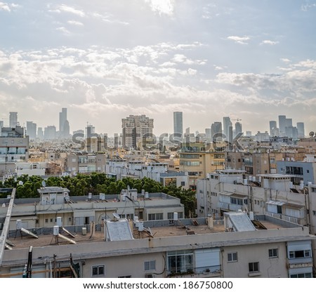 Early morning panorama of Tel Aviv over the roofs to the office skyscrapers