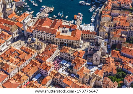 Aerial helicopter shoot of Dubrovnik old town with a view to the Rector\'s Palace and Cathedral.