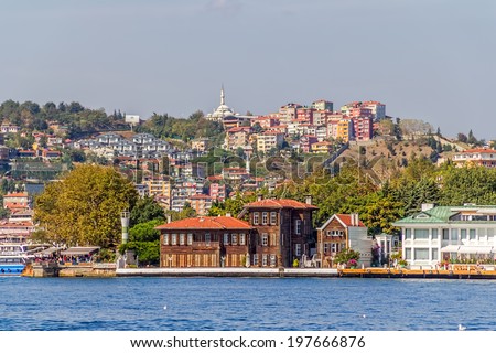 ISTANBUL, TURKEY - SEPTEMBER 29, 2013: Panoramic view of the old waterfront houses in Yenikoy.